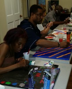 Several of the CHOICE Art Group members hard at work on pieces for ArtsFest in New Rochelle